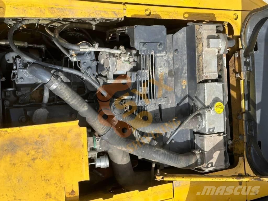 Komatsu PC 130-7 Гусеничные экскаваторы