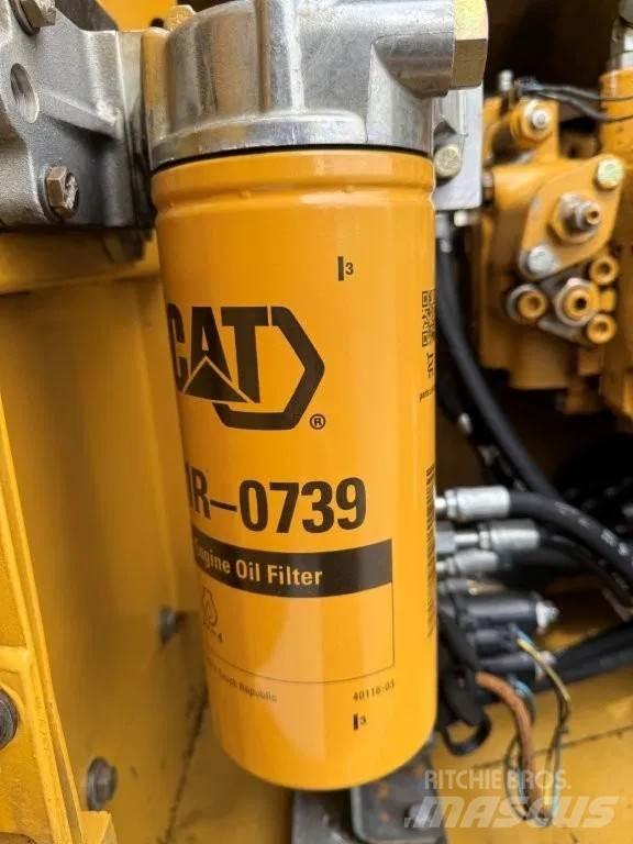 CAT 323DL (320DL) Гусеничные экскаваторы