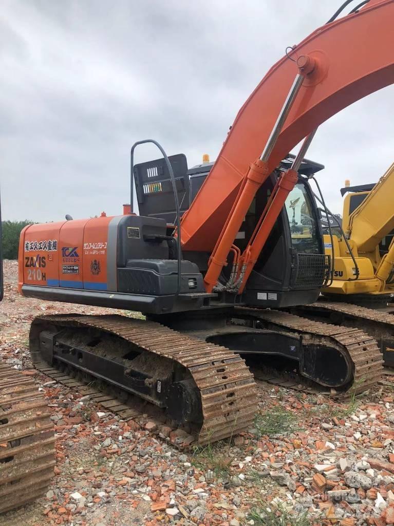 Hitachi ZX 210 Гусеничные экскаваторы
