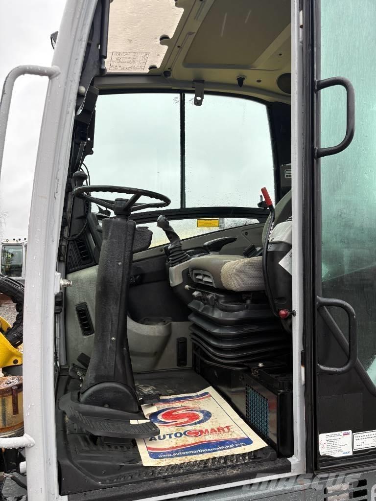 Wacker Neuson EW65 Колёсные экскаваторы
