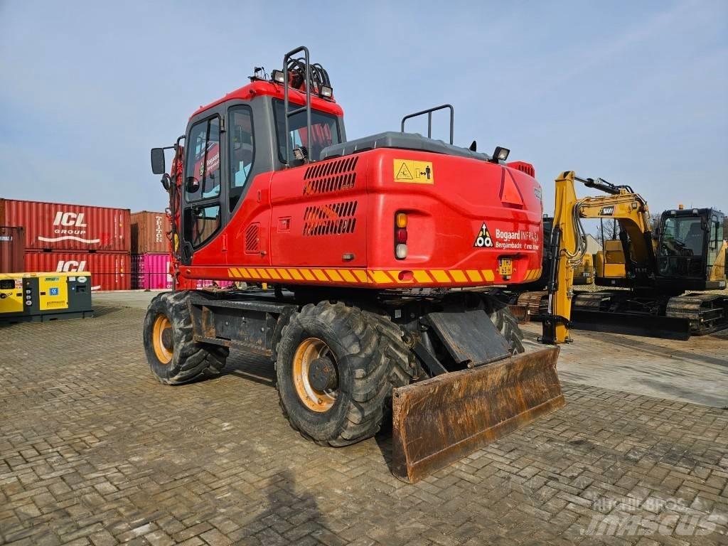 Doosan DX 140 W-3 Колёсные экскаваторы
