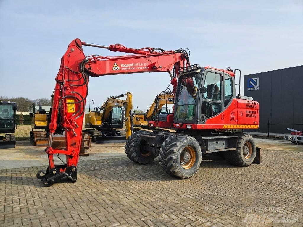Doosan DX 140 W-3 Колёсные экскаваторы