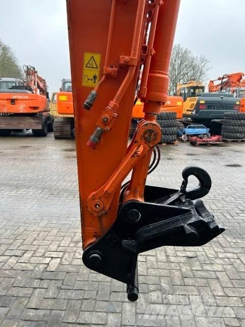 Hitachi ZX140W-5B Колёсные экскаваторы