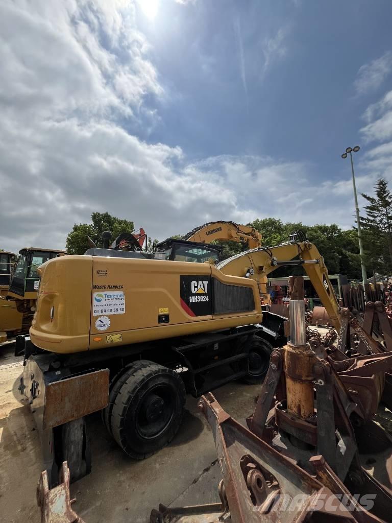 CAT MH 3022 Колёсные экскаваторы