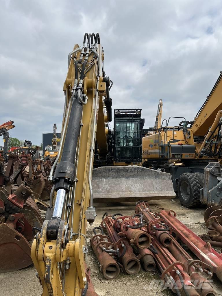 CAT MH 3022 Колёсные экскаваторы