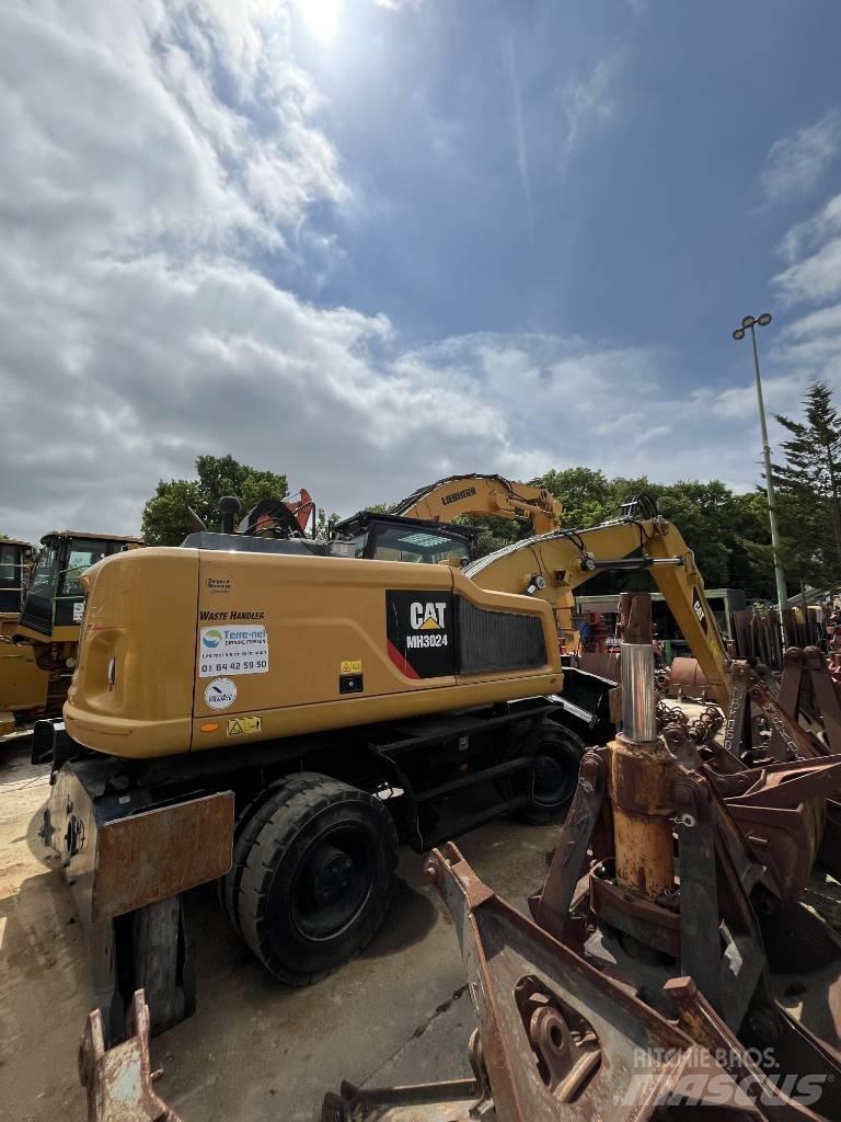 CAT MH 3024 Колёсные экскаваторы