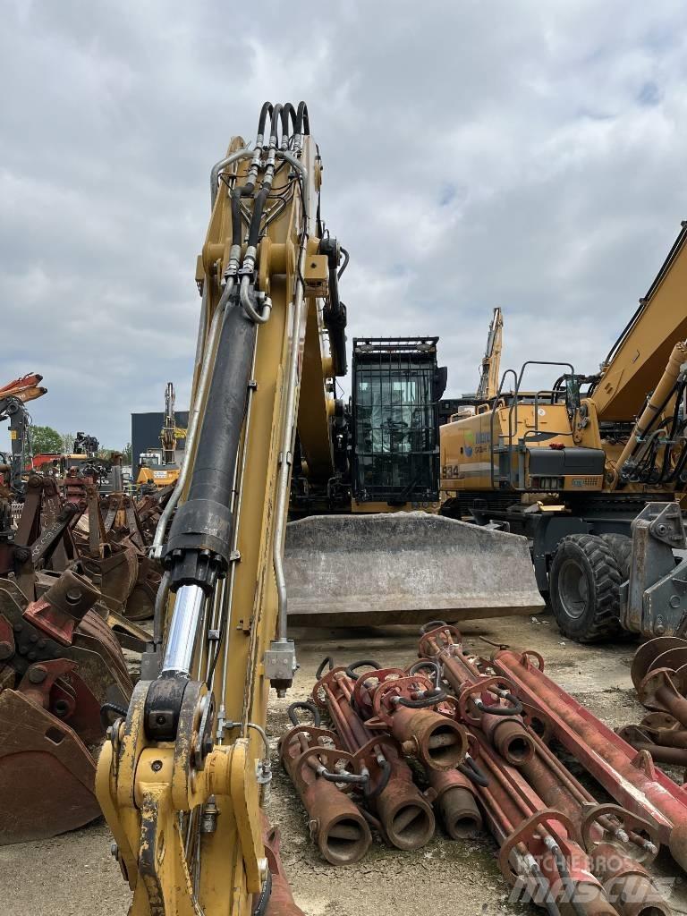 CAT MH 3024 Колёсные экскаваторы