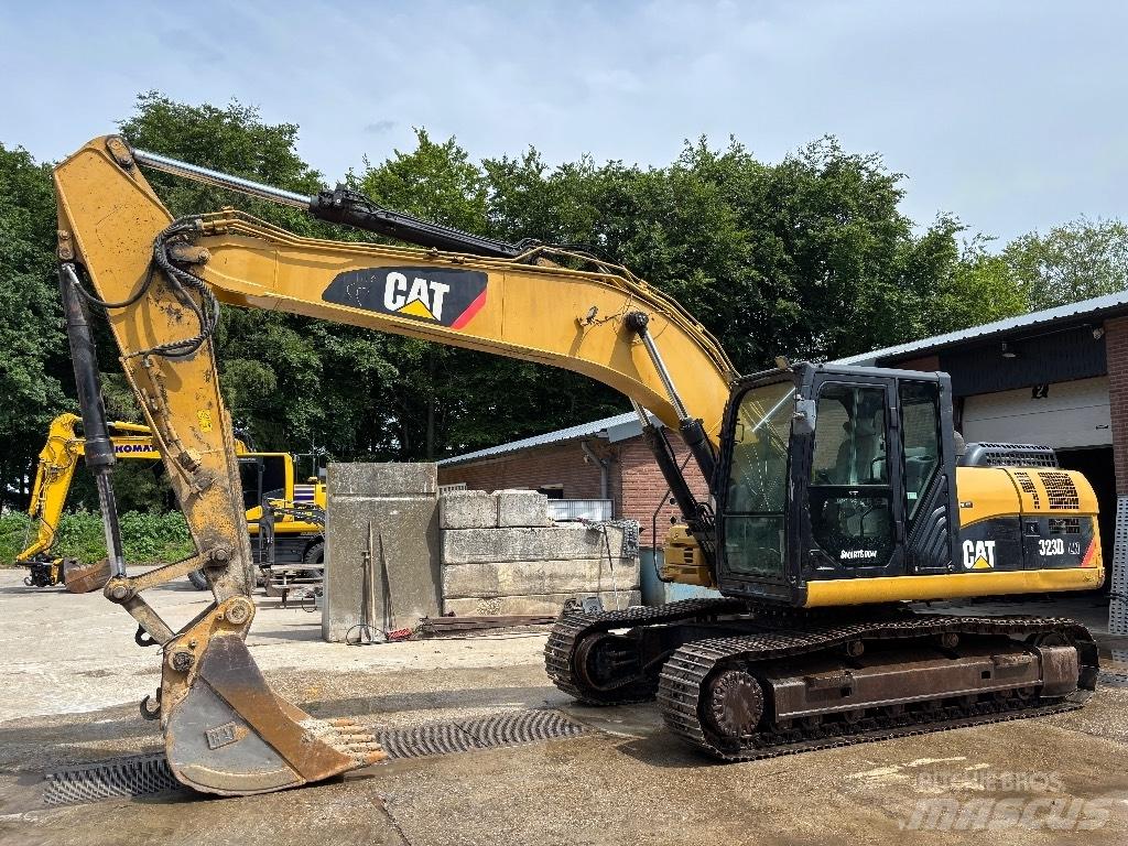 CAT 323 D LN Гусеничные экскаваторы