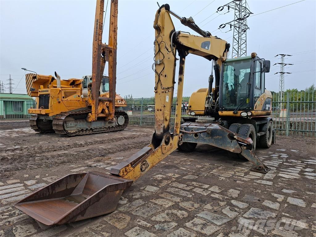 CAT M313D 4X4 Строительная техника - Другие