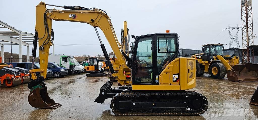 CAT 308 Малые экскаваторы 7т-12т