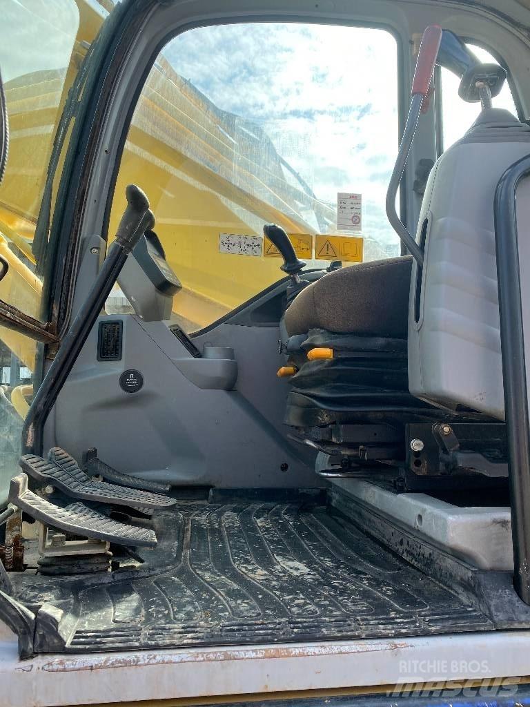New Holland E 305 Гусеничные экскаваторы