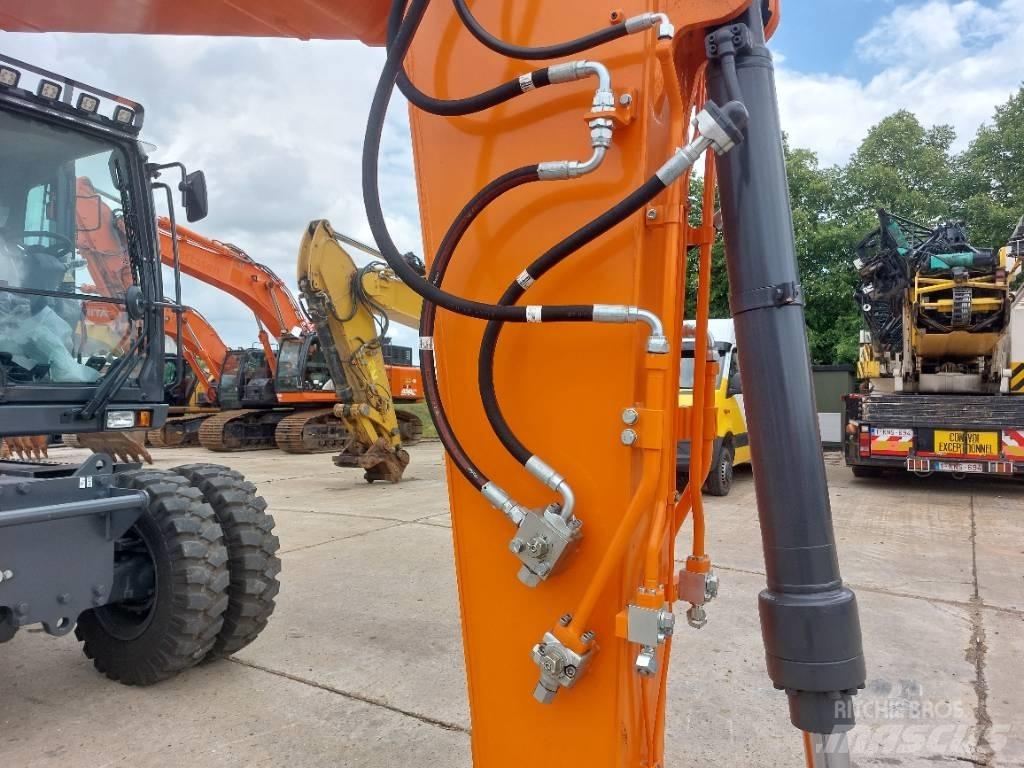 Develon DX 140 W-7 Колёсные экскаваторы