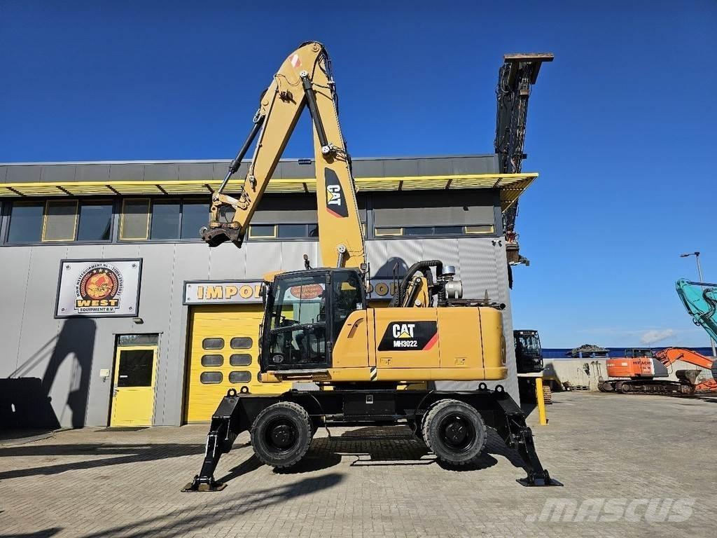 CAT MH 3022 Колёсные экскаваторы