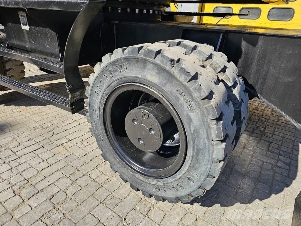CAT MH 3022 Колёсные экскаваторы