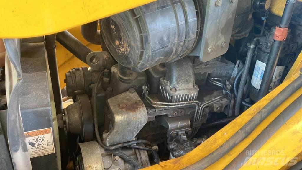 New Holland B 95 B Экскаваторы-погрузчики