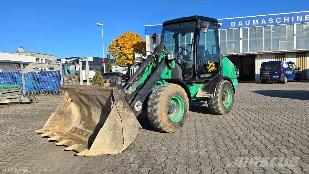 JCB 406 Фронтальные погрузчики