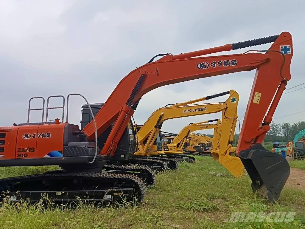 Hitachi ZX 210 Гусеничные экскаваторы