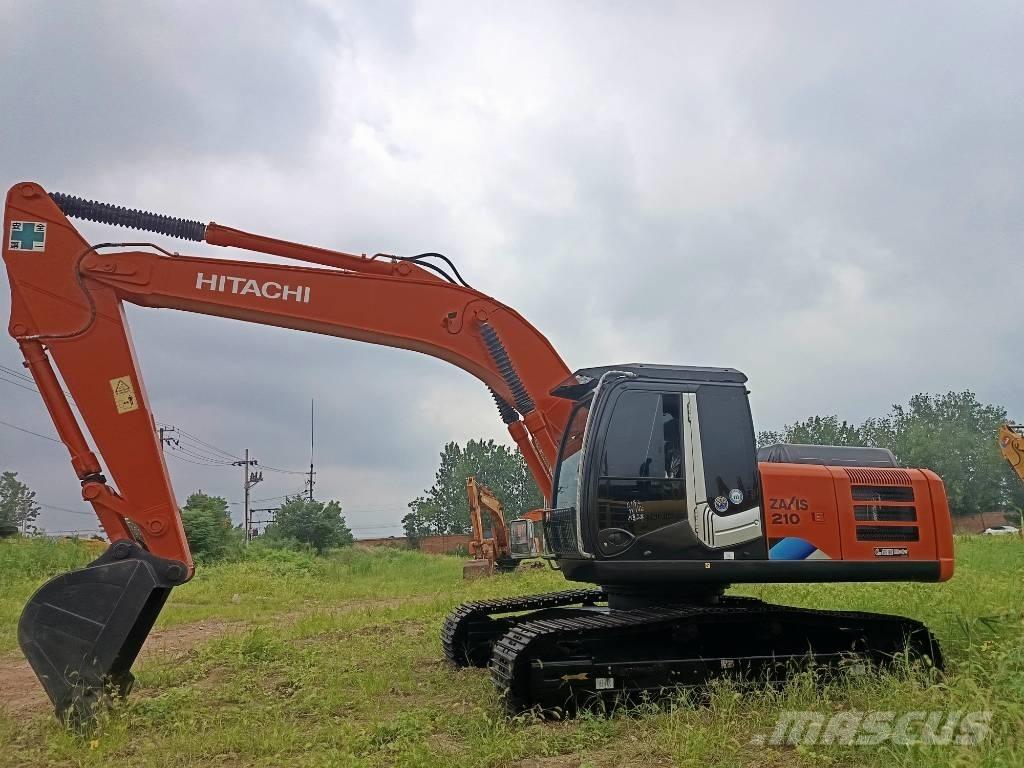Hitachi ZX 210 Гусеничные экскаваторы