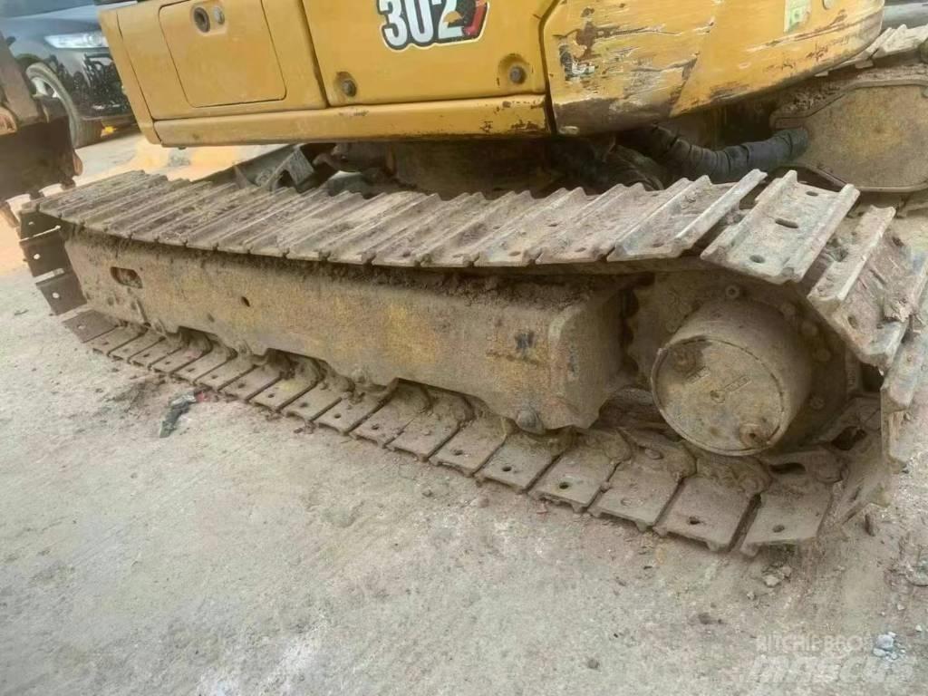 CAT 302 Мини-экскаваторы