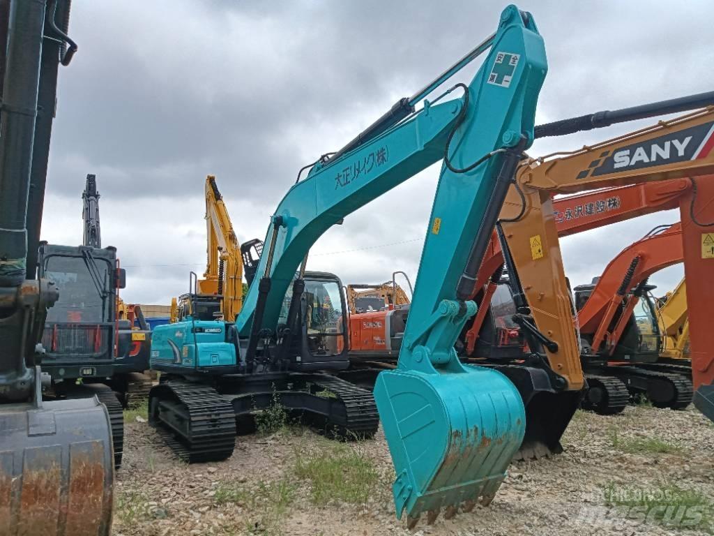 Kobelco SK 210 Малые экскаваторы 7т-12т