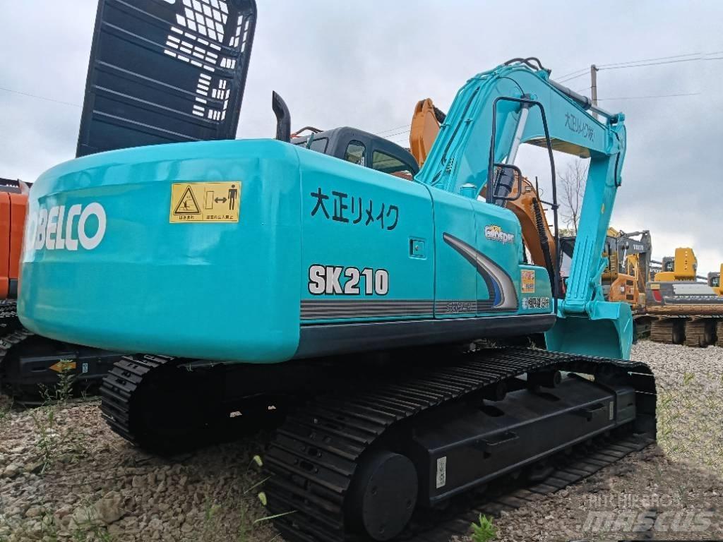 Kobelco SK 210 Малые экскаваторы 7т-12т