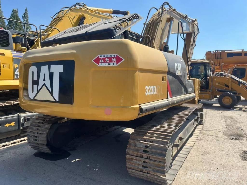 CAT 323 D L Гусеничные экскаваторы