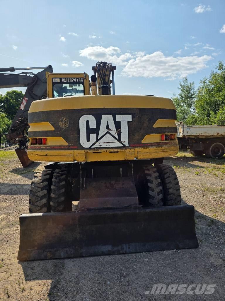 CAT 312 M Колёсные экскаваторы