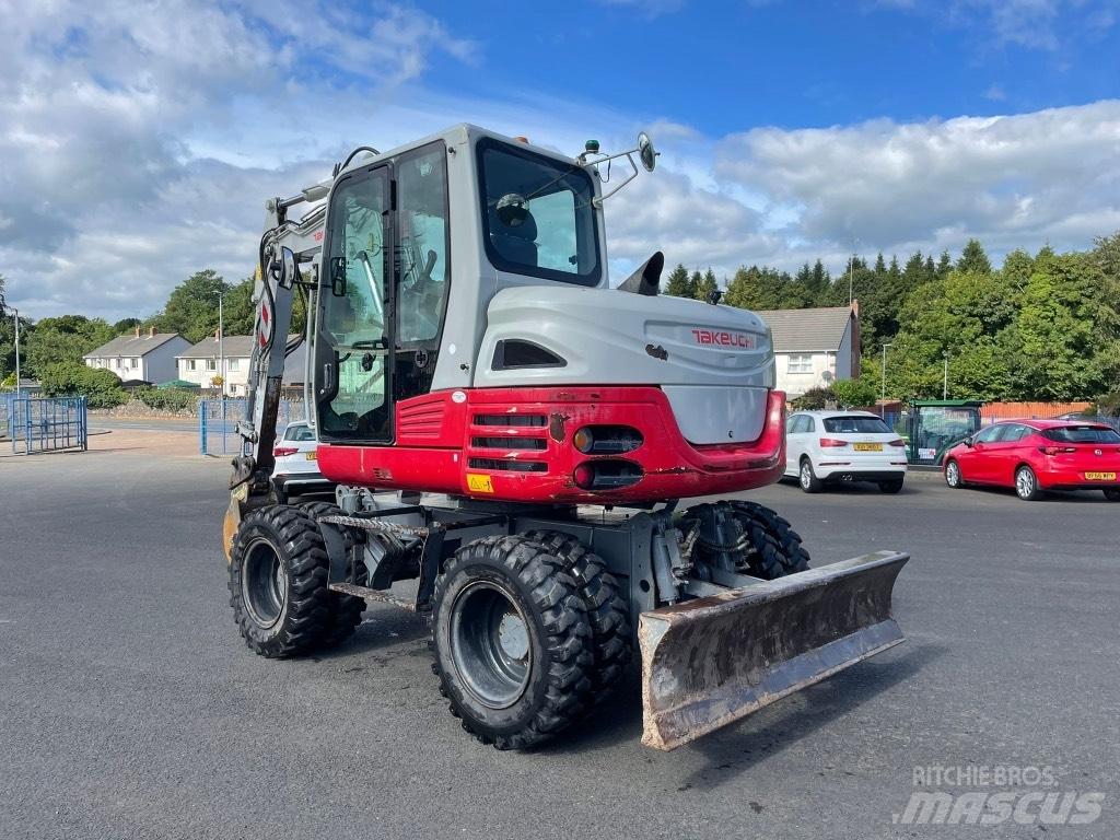 Takeuchi TB295W Колёсные экскаваторы
