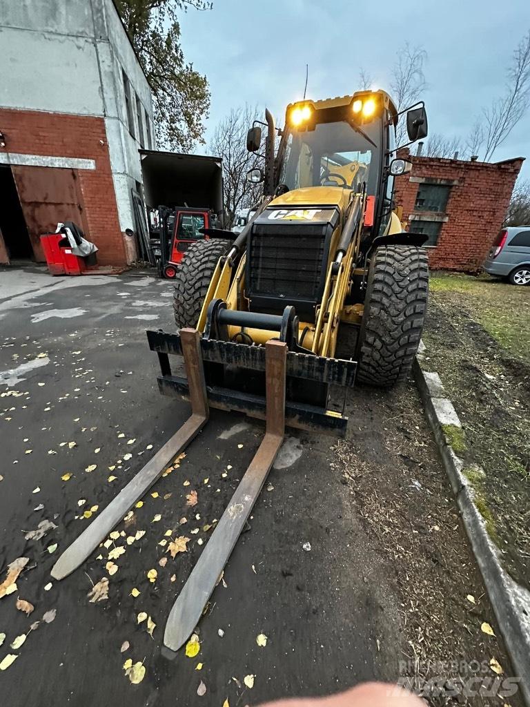 CAT 444F Экскаваторы-погрузчики