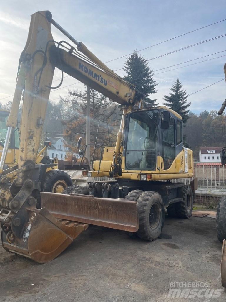 Komatsu PW 130-7K Колёсные экскаваторы