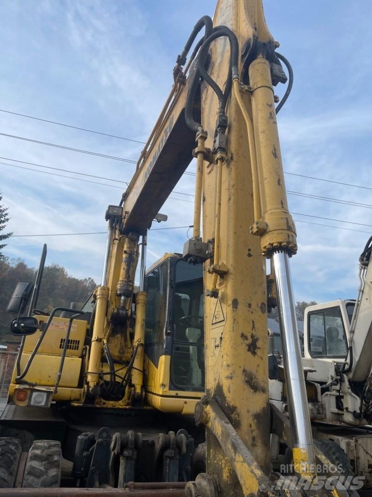 Komatsu PW 130-7K Колёсные экскаваторы