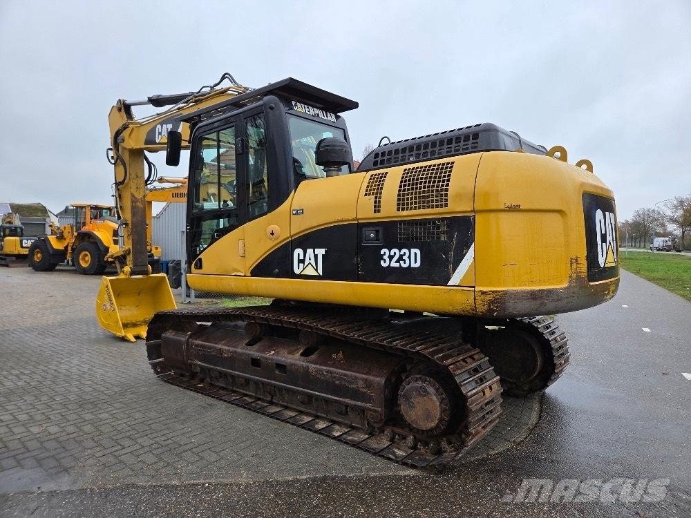 CAT 323DL Гусеничные экскаваторы