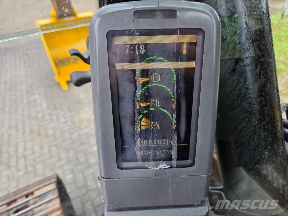 CAT 323DL Гусеничные экскаваторы