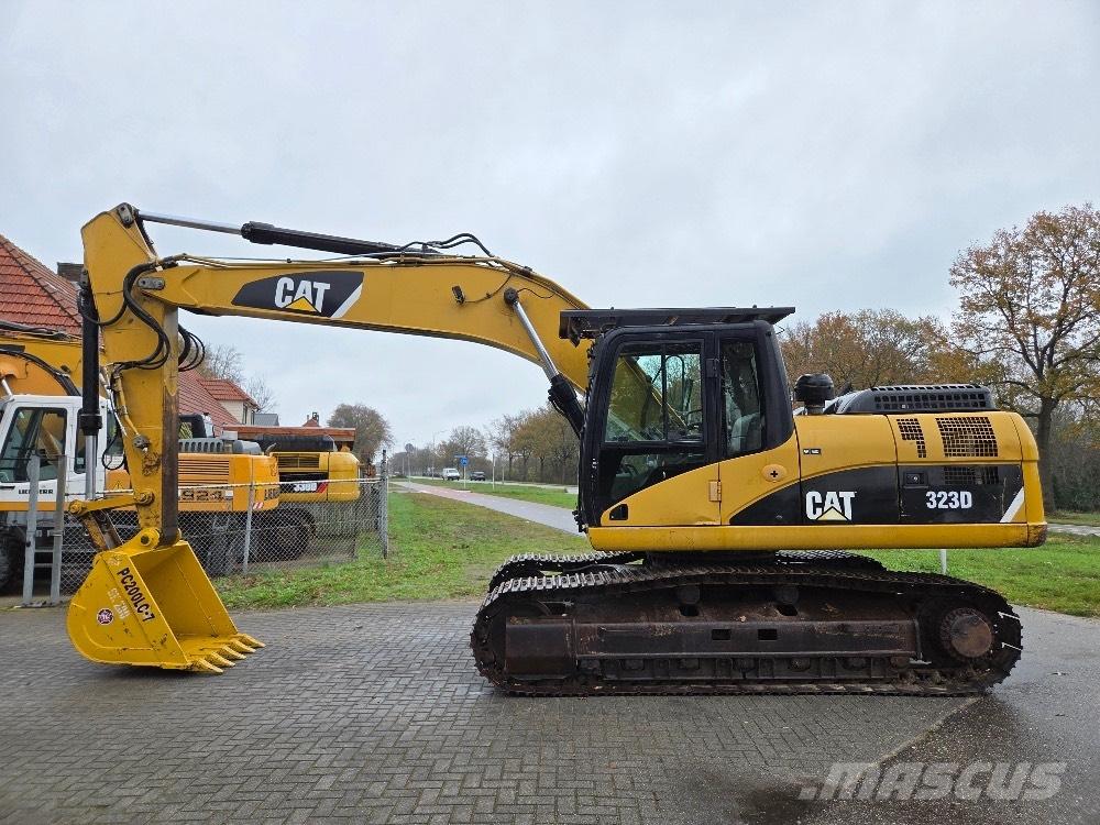 CAT 323DL Гусеничные экскаваторы
