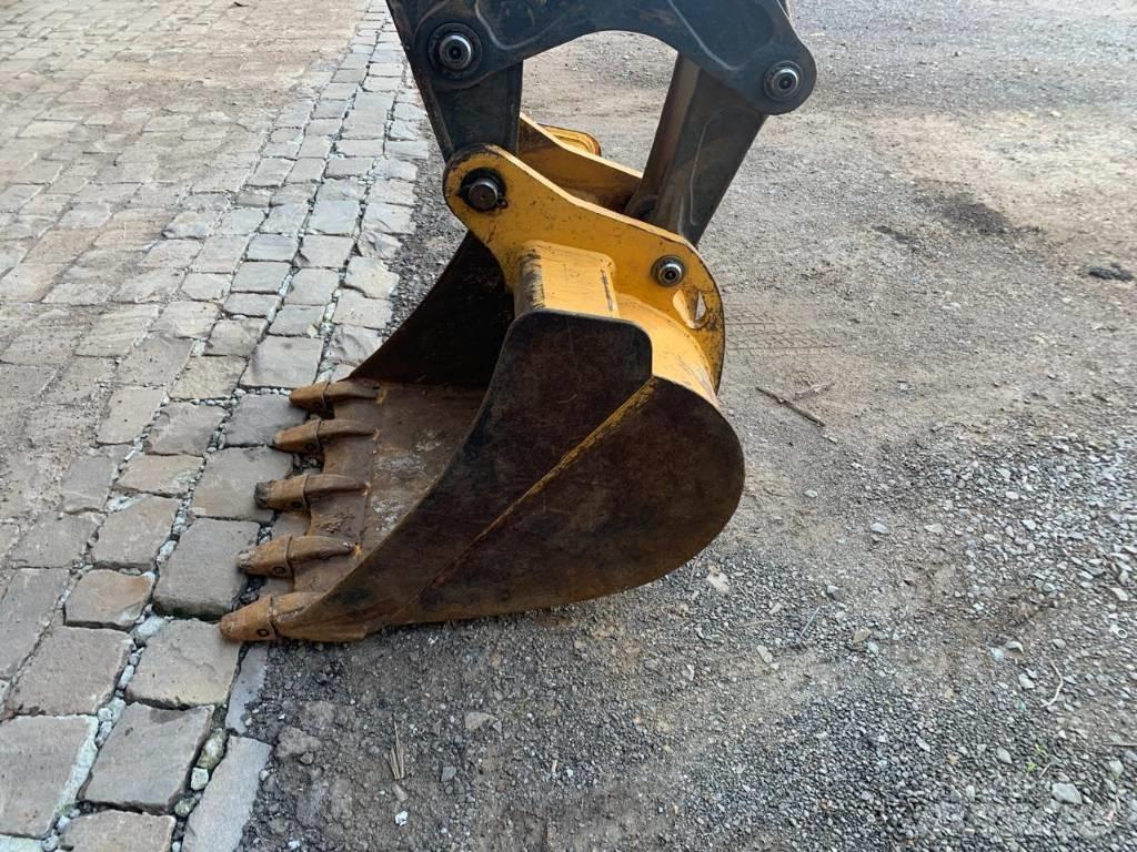 John Deere 310 L Экскаваторы-погрузчики