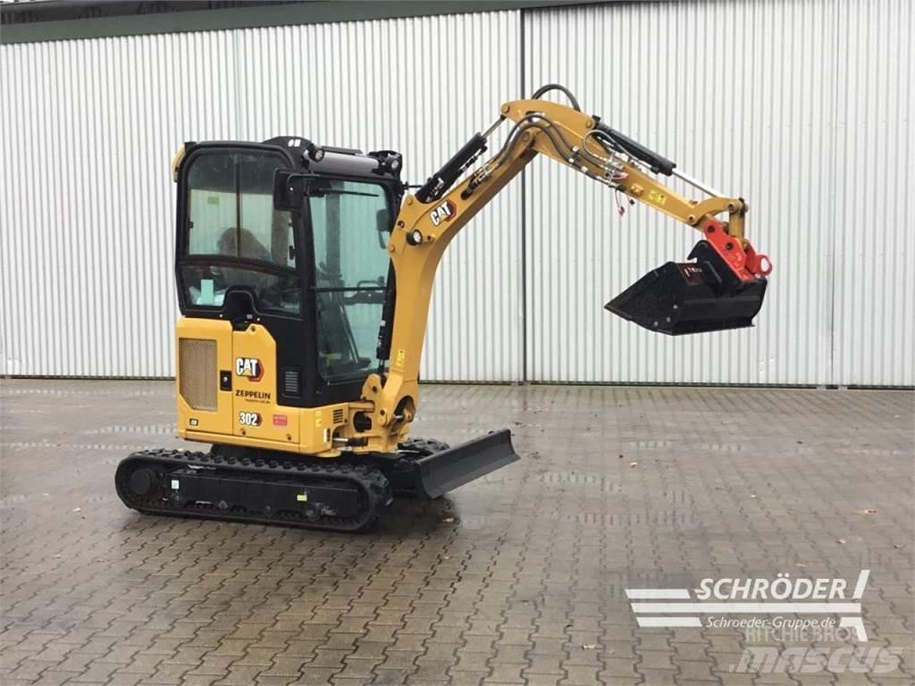CAT 302 CR Колёсные экскаваторы