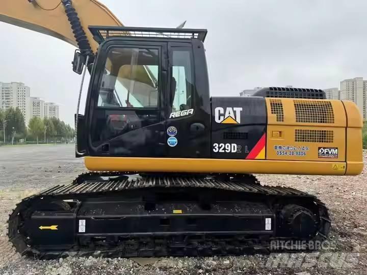 CAT CAT329D2L Малые экскаваторы 7т-12т