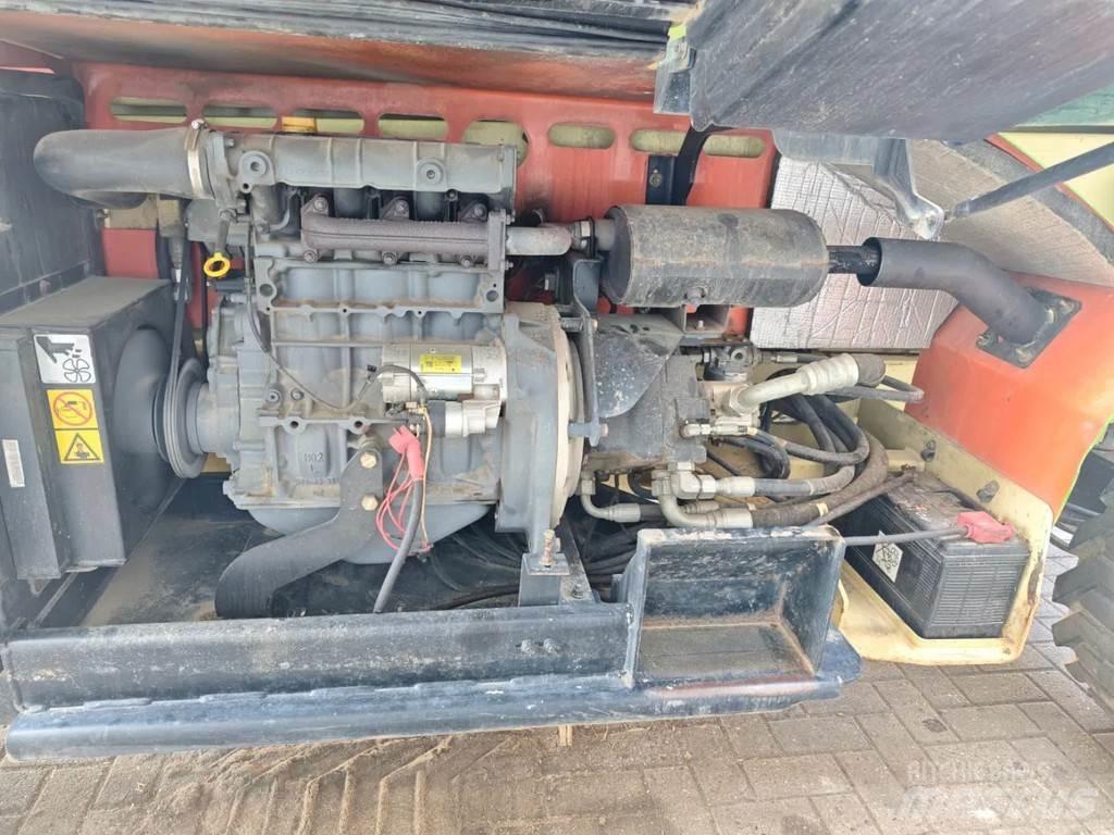 JLG 4394 RT Ножничные подъемники