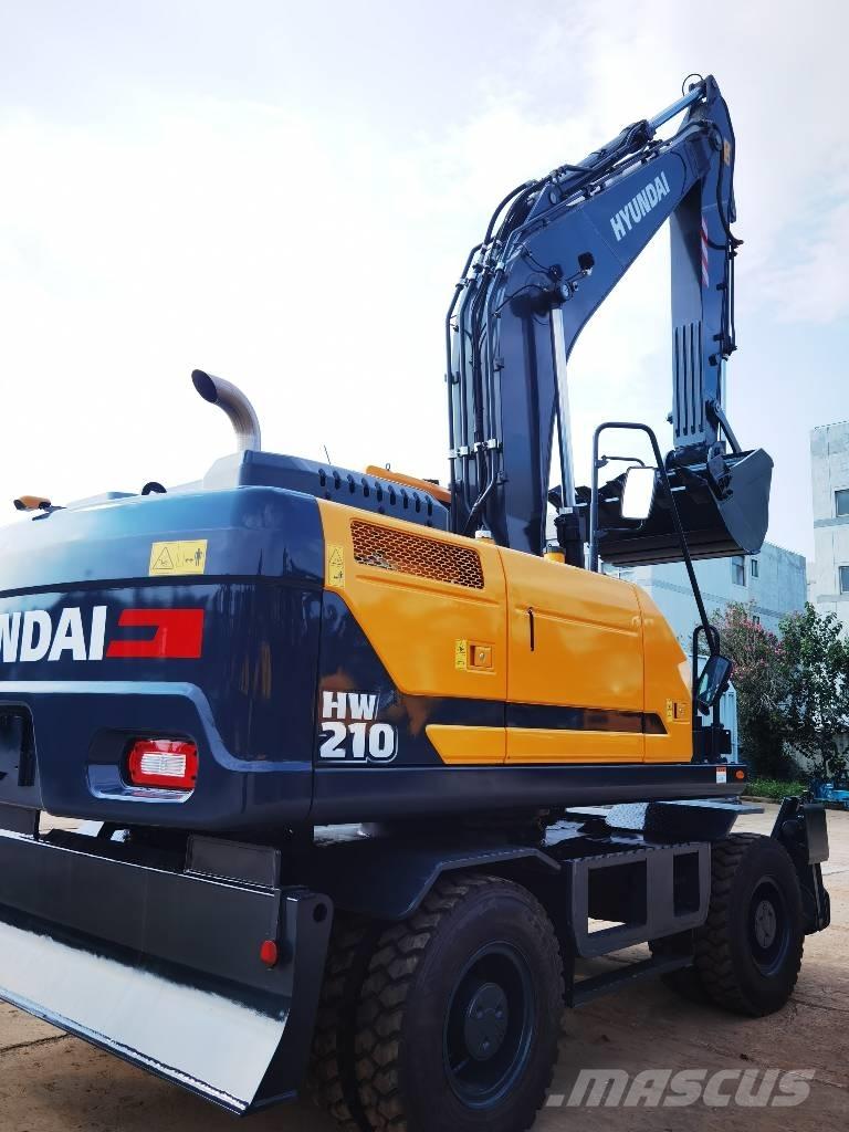 Hyundai 210W-9 Колёсные экскаваторы