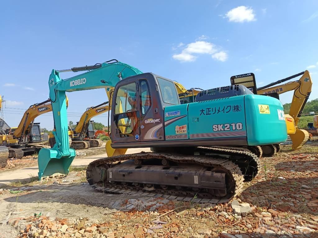 Kobelco SK210 Гусеничные экскаваторы