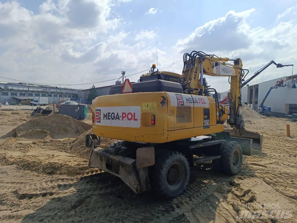 Komatsu PW180-7E0 Колёсные экскаваторы