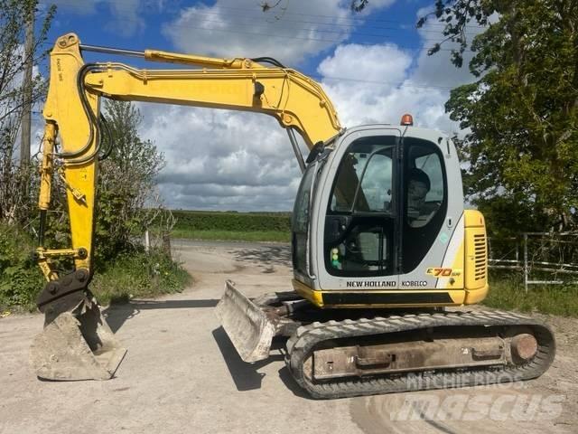 New Holland E 70 SR Малые экскаваторы 7т-12т