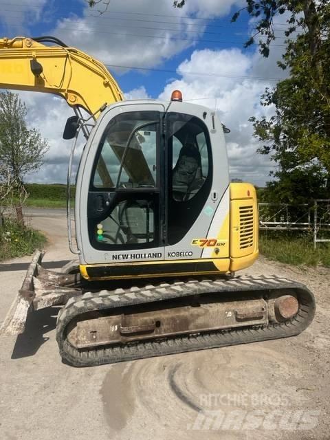 New Holland E 70 SR Малые экскаваторы 7т-12т
