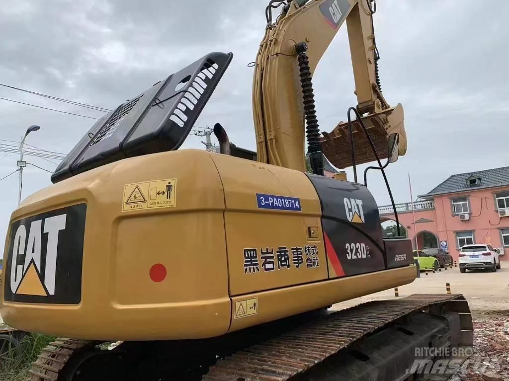 CAT 323 D L Гусеничные экскаваторы