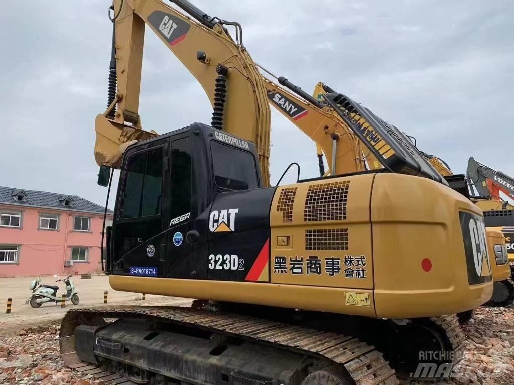 CAT 323 D L Гусеничные экскаваторы
