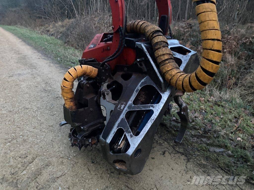 Komatsu C 144 Харвестеры