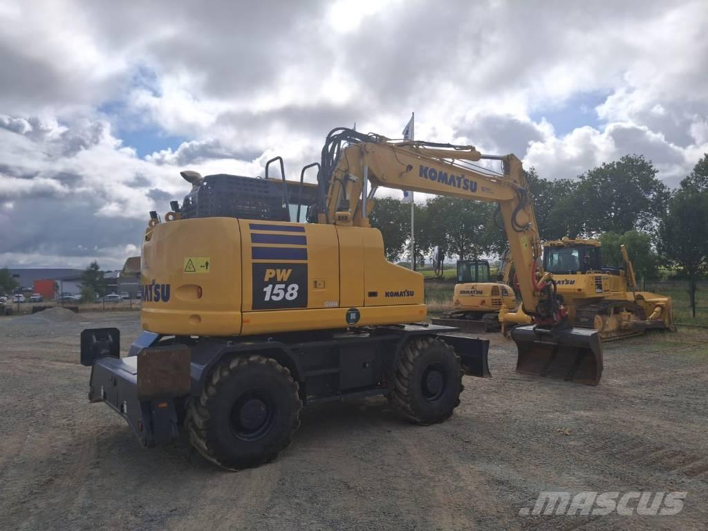 Komatsu PW158-11 Колёсные экскаваторы