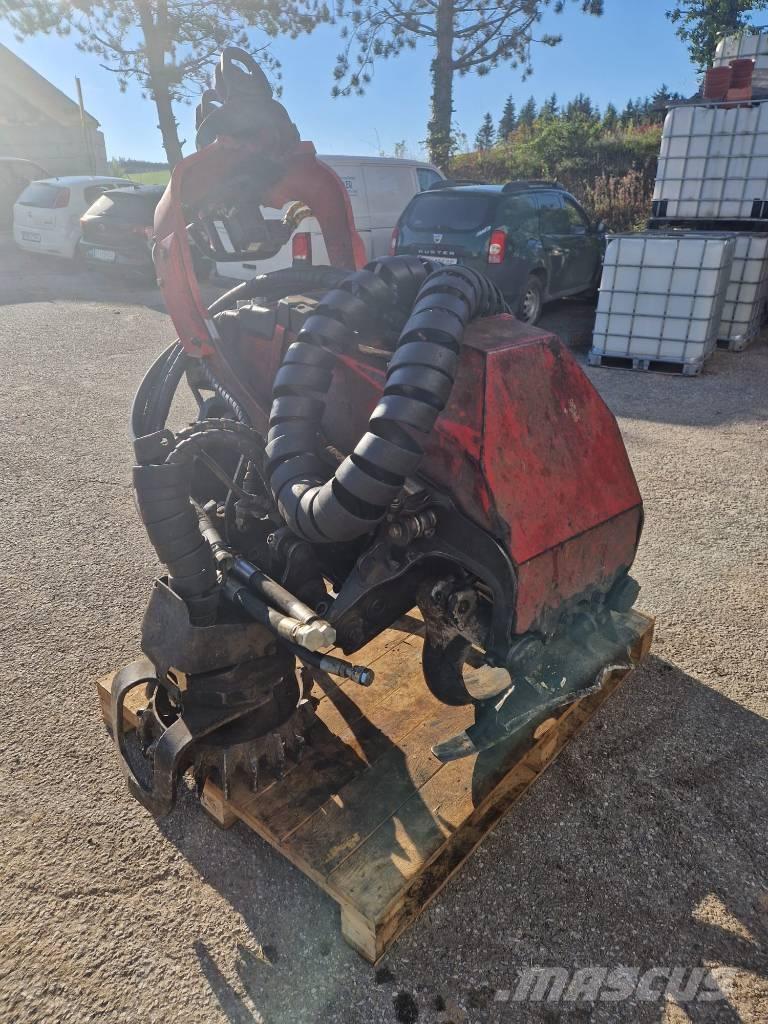 Komatsu 124 Сучкорезы