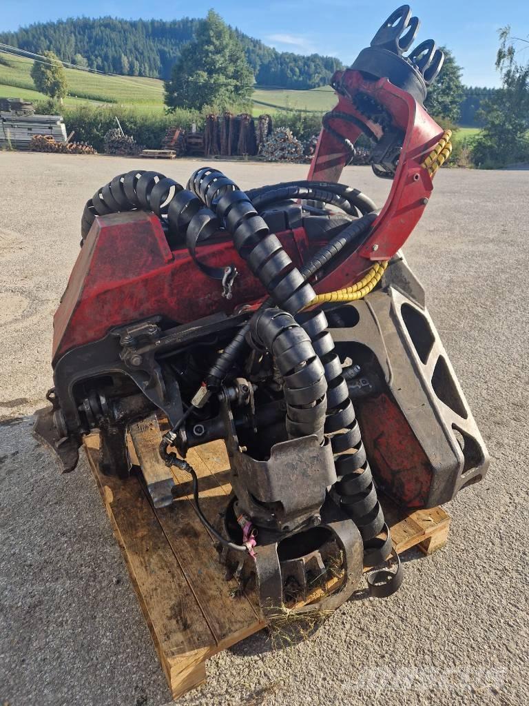 Komatsu 124 Сучкорезы