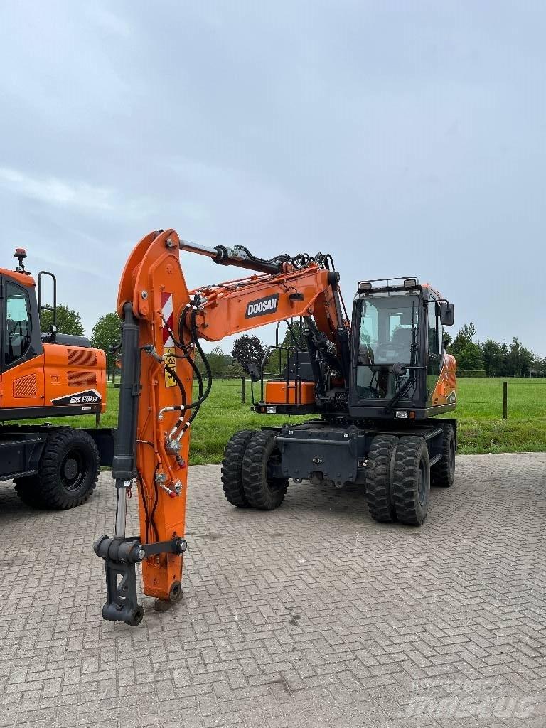 Develon DX140W-7 Колёсные экскаваторы